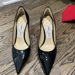 Gorgeous Jimmy Choo 36 never worn outside. Heel protector placed inside.